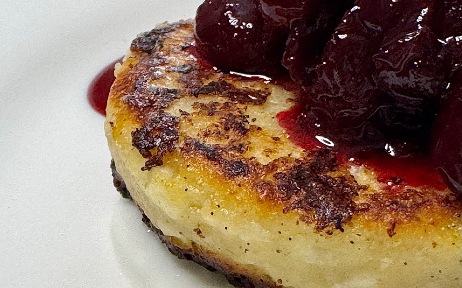 Vanilla Syrniki with Sour Cherries and Yogurt